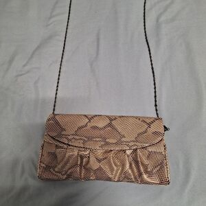 Unbranded crossbody clutch Faux Snakeskin with additional chains for carrying.
